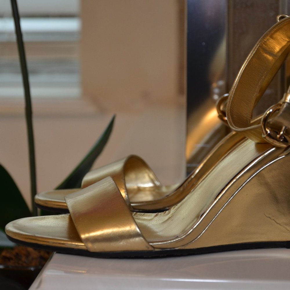 Gold Gucci Heels.
